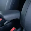Миниатюра Kia PV5 WAV на парковке возле деревьев