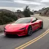 Предварительное изображение Tesla Roadster с открытыми дверями