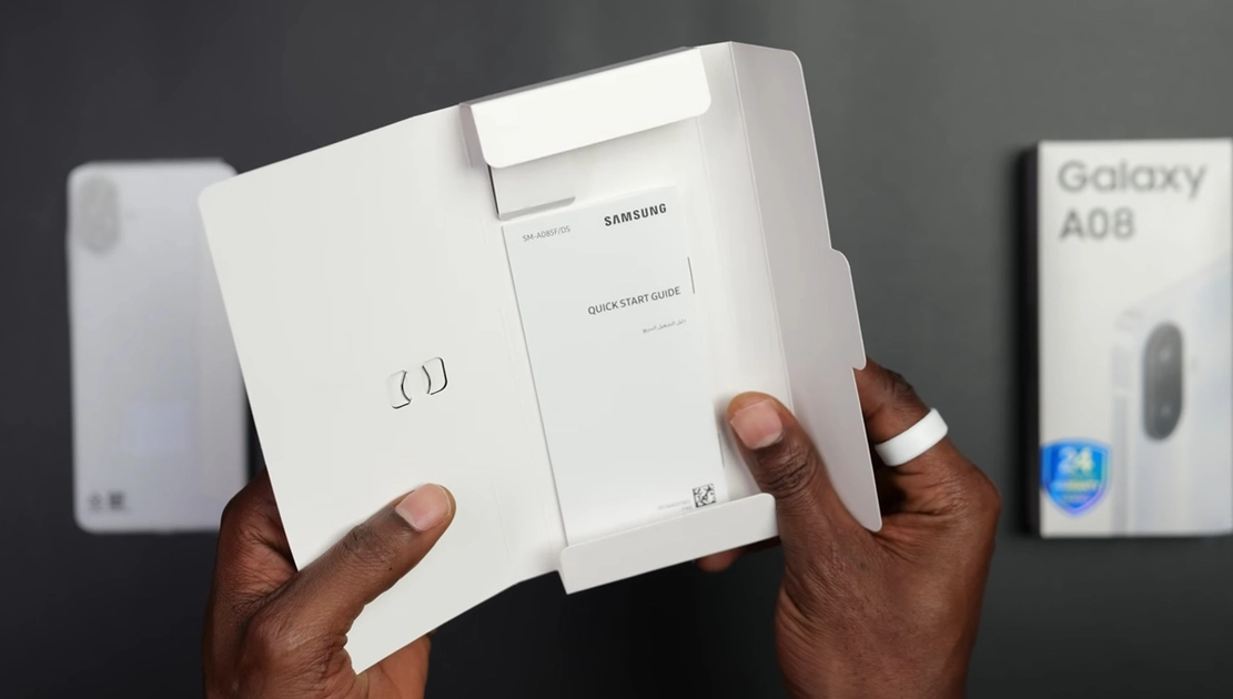 Galaxy A07s and A08 boxes contain only the phone, documentation, and a SIM tool—no cable or charger.
