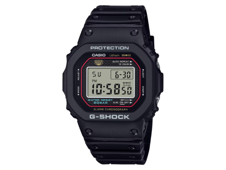 G-Shock DW5000R watch against the cityscape