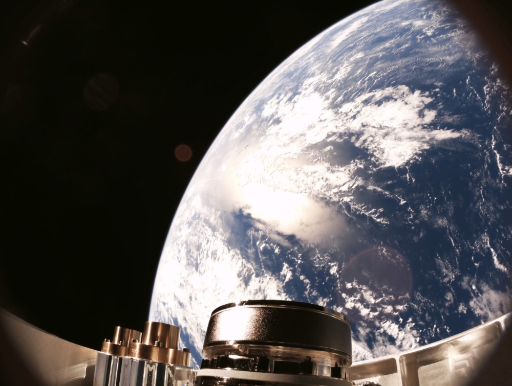 The Starlight zinc-propellant thruster firing in orbit, as captured by SERT-III's onboard camera. Illustration: Muon Space