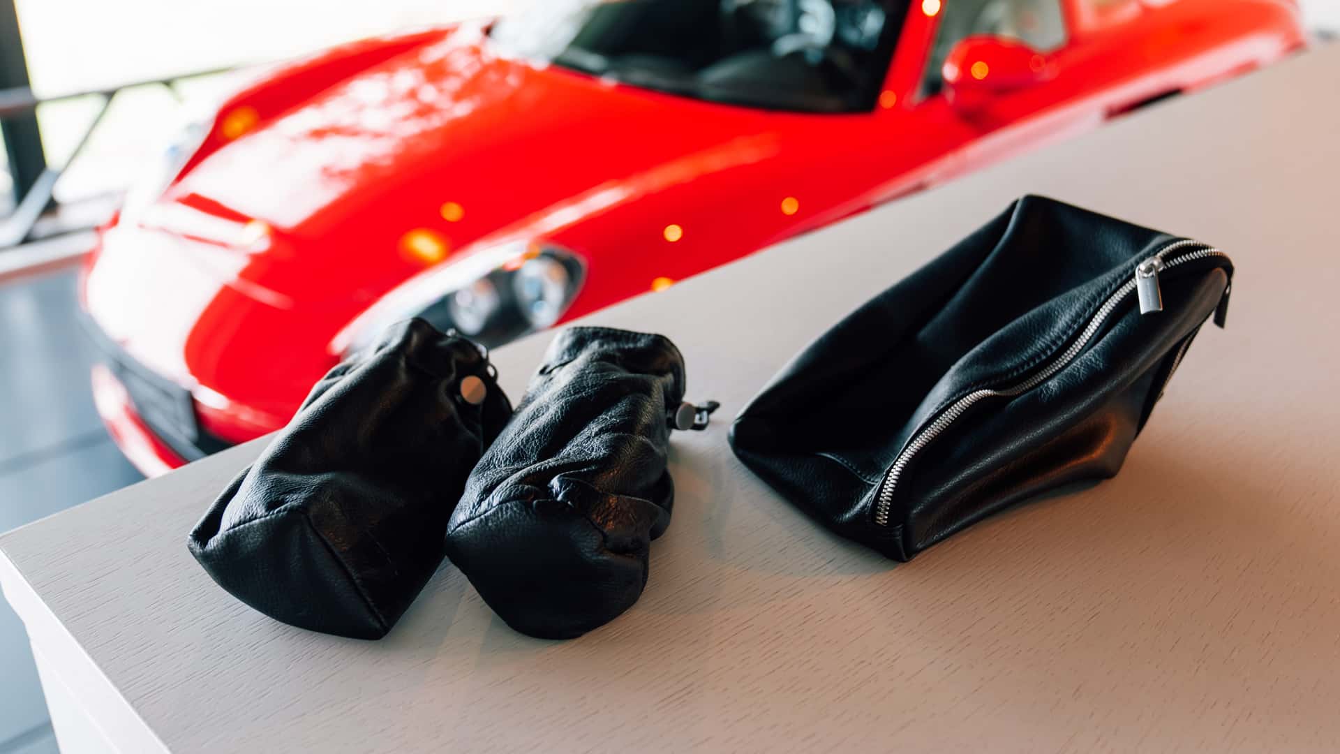 Wheel of Porsche Carrera GT in Guards Red